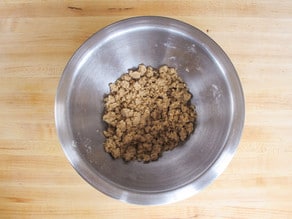 Prepared streusel topping in a bowl.