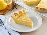 Lemon Vanilla Buttermilk Pie featuring a flaky crust, creamy filling, and a hint of citrus flavor
