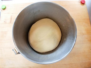 Dough ball in bowl to rise.