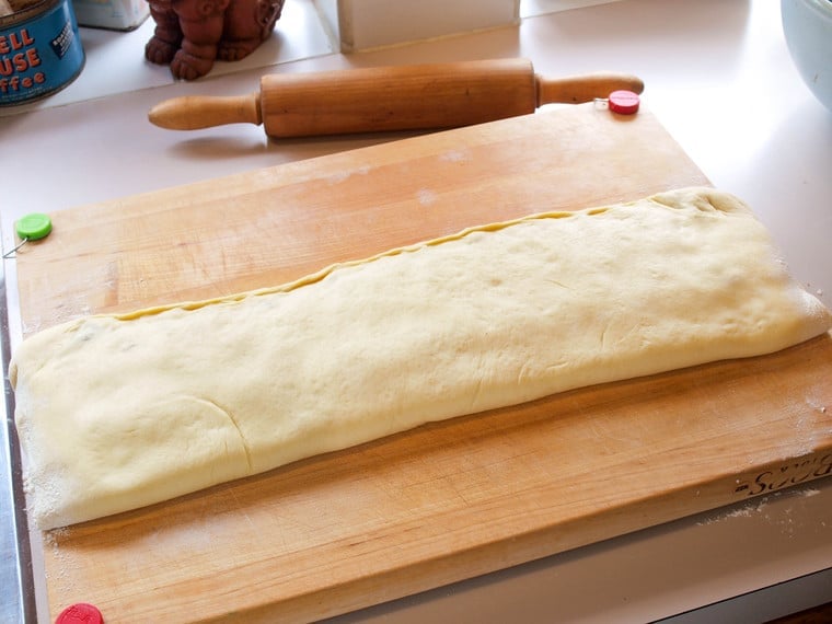 Pecan roll dough folded into thirds.