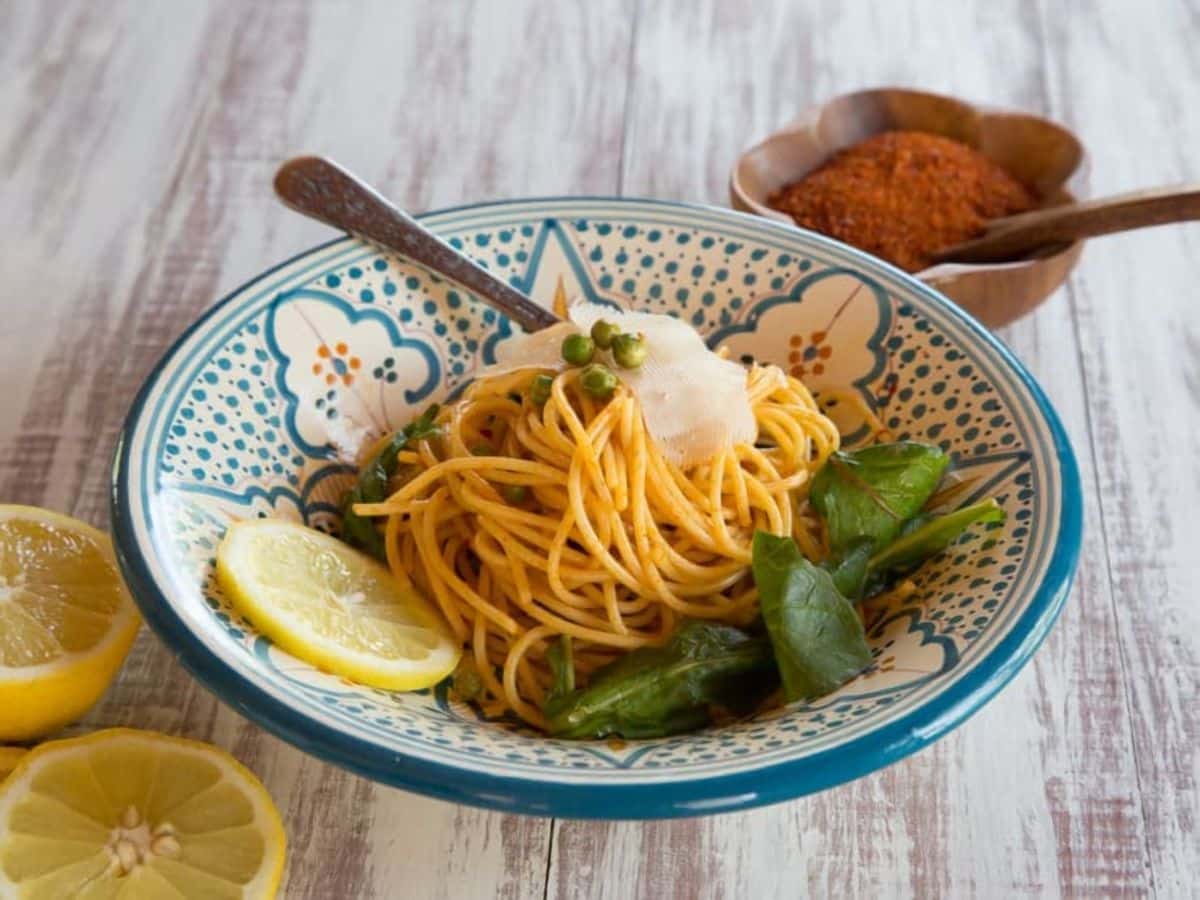 Smoky Pasta with Peas and Greens - Simple vegetarian Pasta Carbonara-like dish with smoked paprika, lemon and spices with vegan and gluten free modifications.
