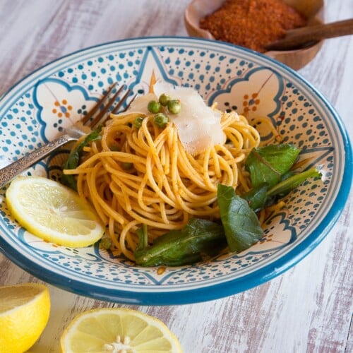 Smoky Pasta with Peas and Greens - Simple vegetarian Pasta Carbonara-like dish with smoked paprika, lemon and spices with vegan and gluten free modifications.