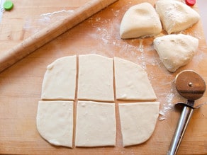 Rolled dough cut into six pieces.