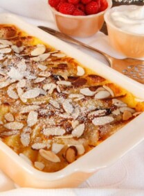 Bread Pudding topped with slivered almonds.