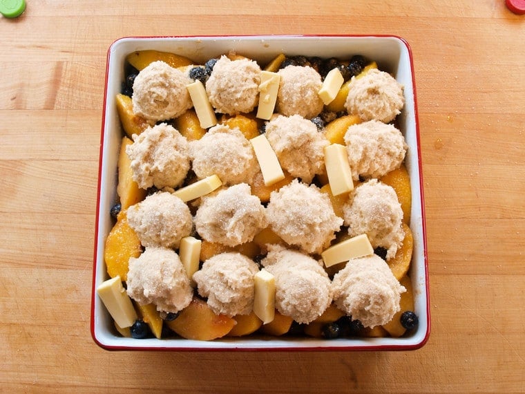 Biscuit dough dropped on fruit filling.