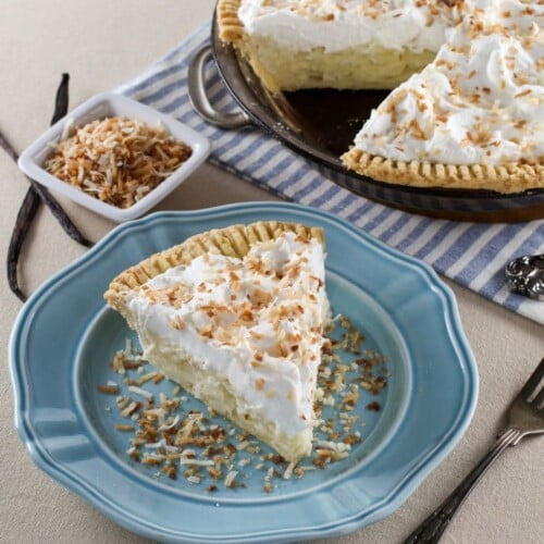 Coconut Cream Pie – Flaky All-Butter Crust Filled with Coconut Cream and Topped with Lightly Sweetened Whipped Cream and Toasted Coconut. Nostalgic, Family-Inspired Recipe from Kelly Jaggers