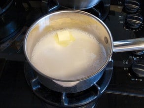 Butter and milk in pot