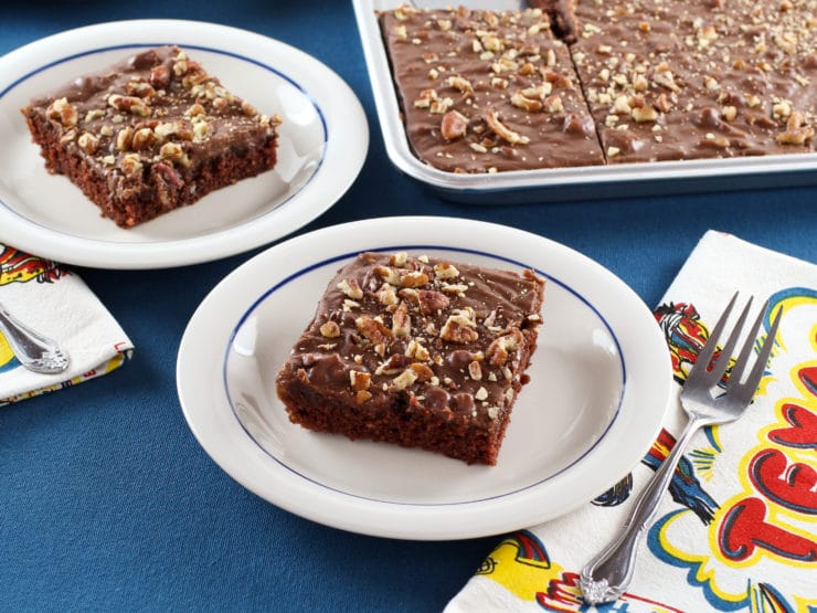 A tempting sight of two plates holding Texas Sheet Cake