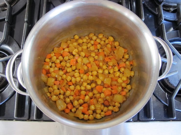 Moroccan Chickpea and Lemon Couscous Soup - Flavorful vegetarian soup recipe from Lick Your Plate by Julie Albert and Lisa Gnat