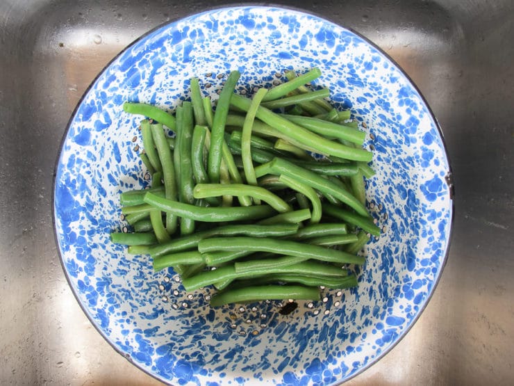 Skillet Seared Lemon Green Beans with Cotija Cheese - Easy flavorful vegetable side dish recipe on ToriAvey.com