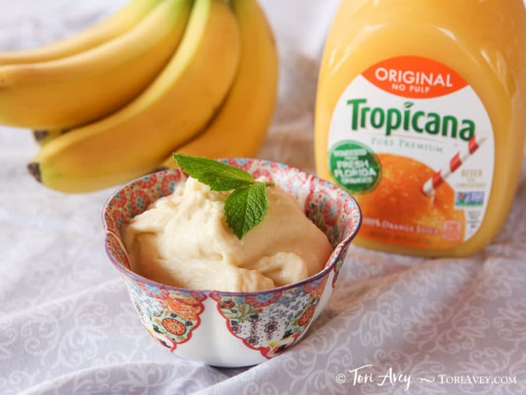 A delightful image of Tropicana orange sorbet, a creamy, refreshing treat made with only two ingredients