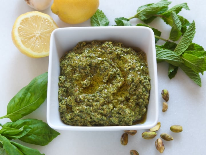 Pistachio Mint Pesto - Flavorful fresh herb pesto sauce with fresh mint, roasted garlic, basil, lemon and parmesan.