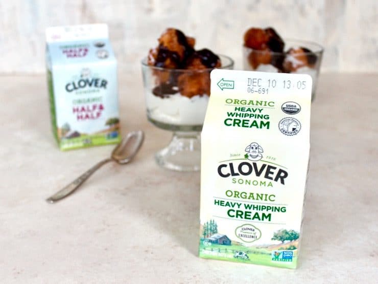 Clover Organic Heavy Whipping Cream with Hanukkah Fritter Sundaes with Warm Chocolate Sauce in the background along with Clover Organic Half & Half