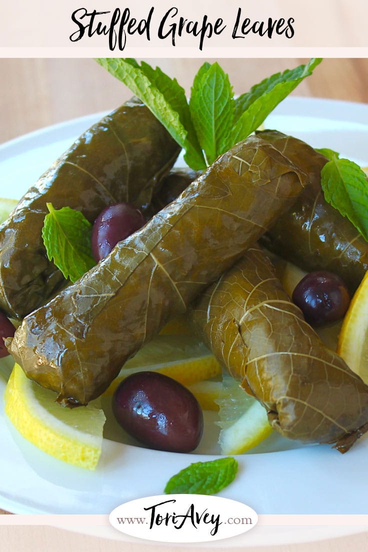 Vegetarian Stuffed Grape Leaves - Learn to make vegetarian stuffed grape leaves, also known as dolmades, with rice, pine nuts, dill, mint, and lemon. Kosher, pareve, gluten free. | ToriAvey.com #glutenfree #vegetarian #grapeleaves #dolmas #TorisKitchen