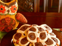 Owl-shaped cookies on a plate