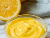 Hollandaise sauce lemon curd in a bowl, a tangy and creamy spread made