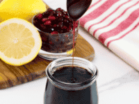 A jar of homemade pomegranate syrup, also known as Pomegranate Molasses