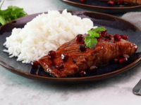 A succulent salmon fillet with a sweet and tangy glaze made from pomegranate molasses